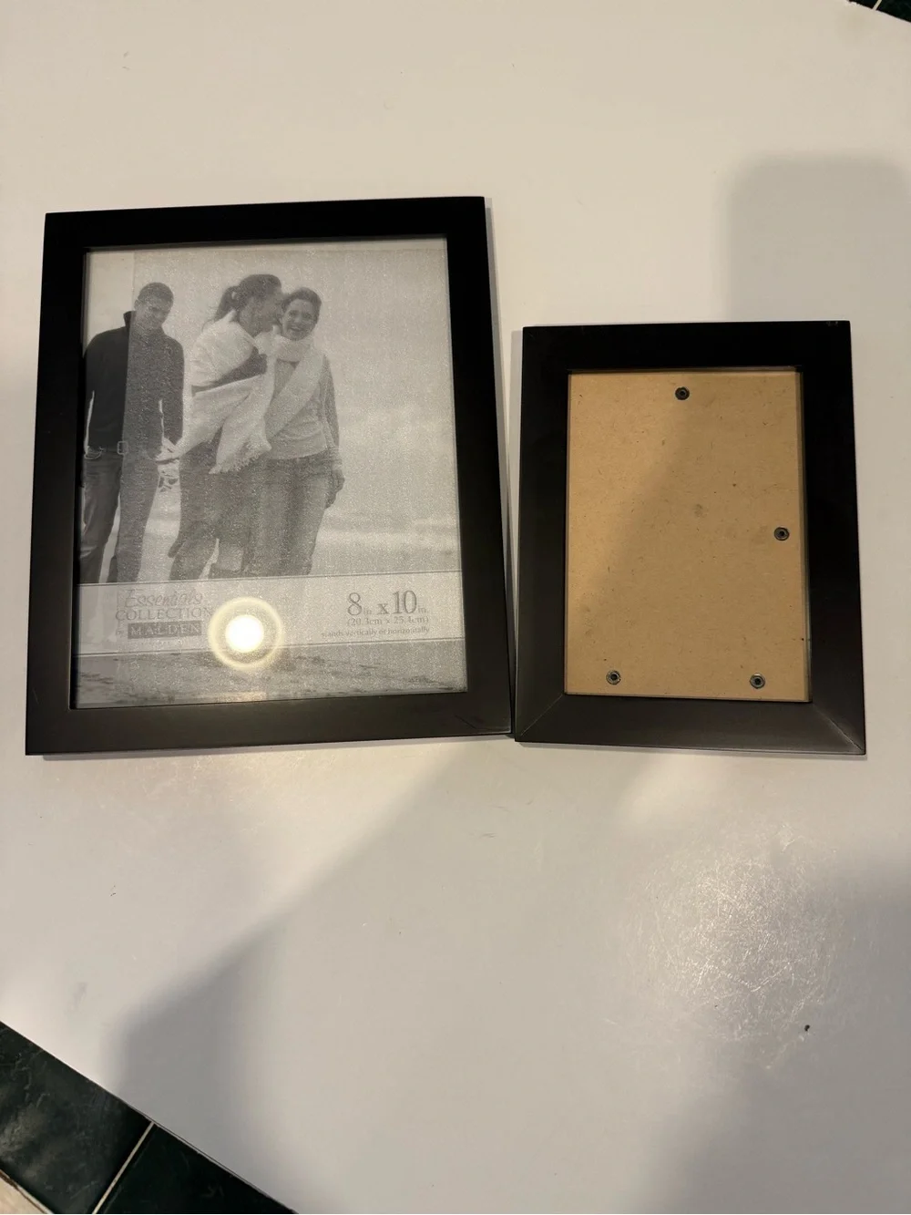 SET OF TWO BLACK PICTURE FRAMES ONE 8x10- ONE 5x7